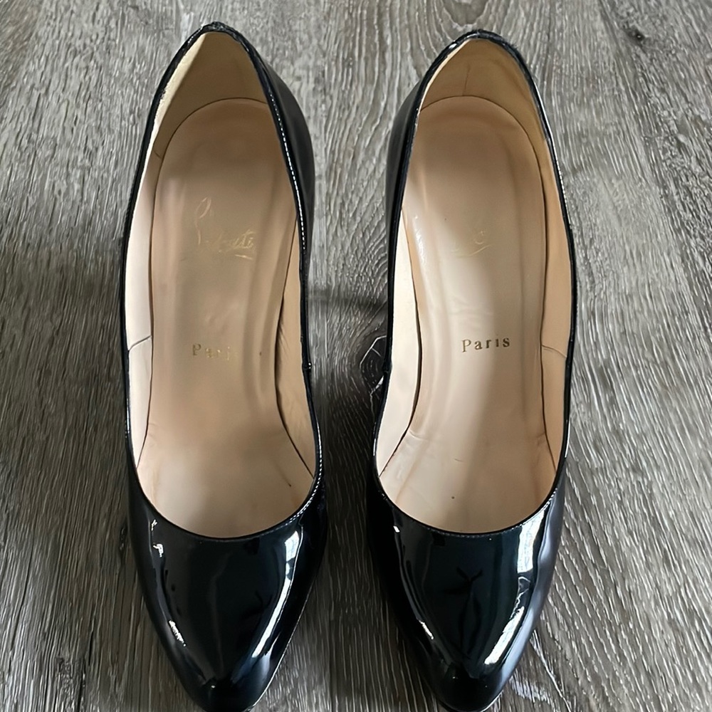 Christian Louboutin black patent leather pumps